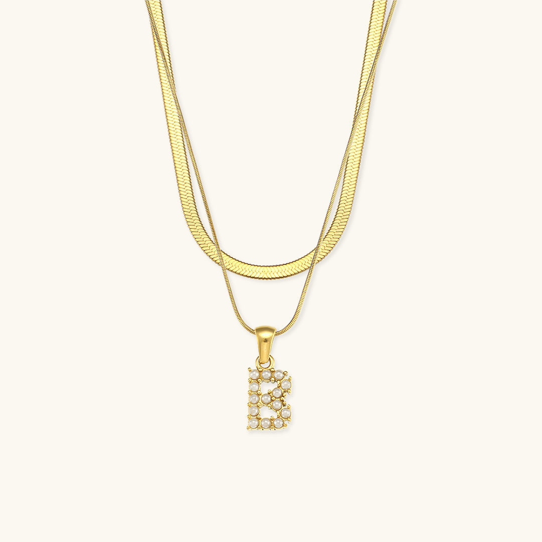 Fiona Lagd Gull Initialhalskjede" could be rewritten as "Fiona Gold Initial Necklace.