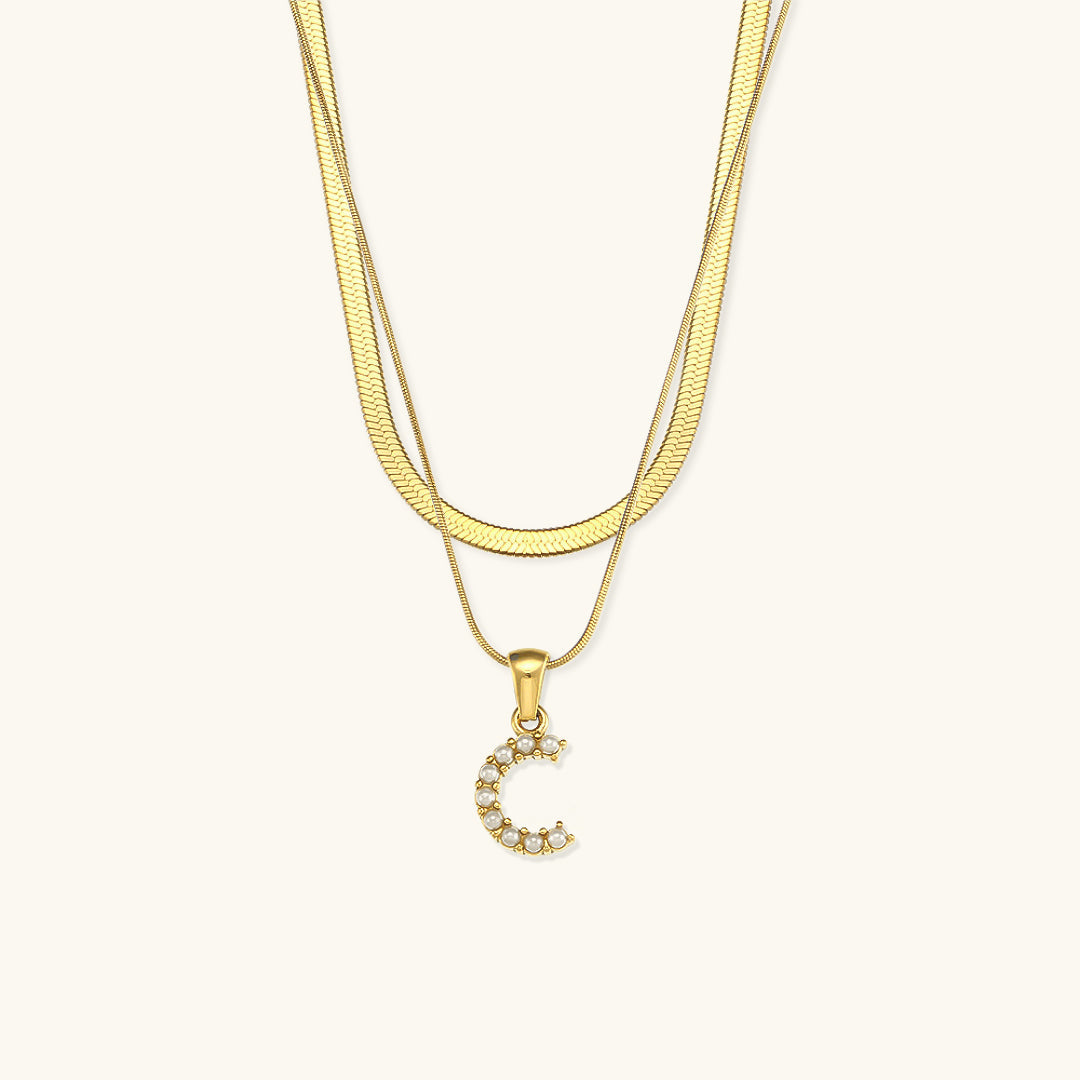 Fiona Lagd Gull Initialhalskjede" could be rewritten as "Fiona Gold Initial Necklace.