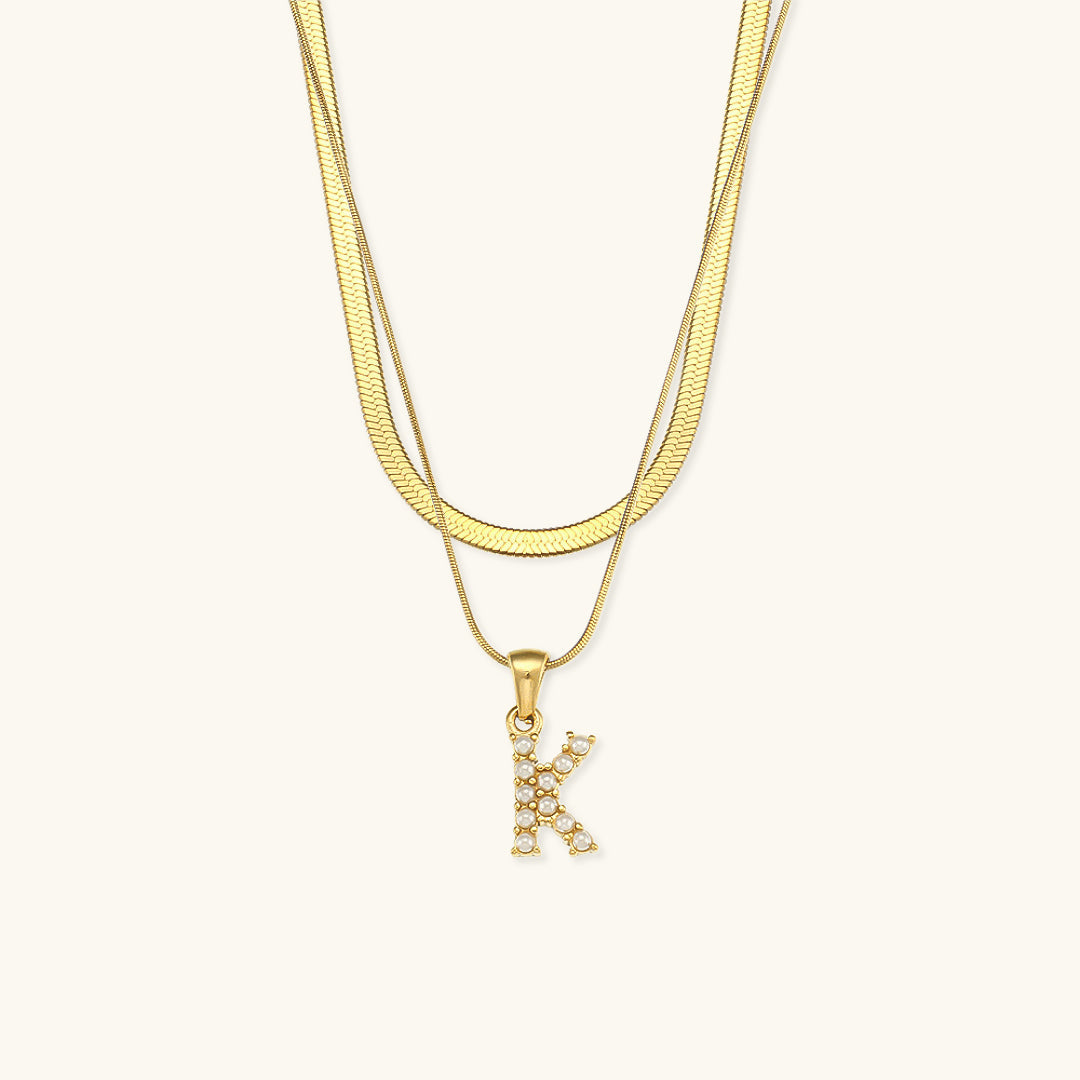 Fiona Lagd Gull Initialhalskjede" could be rewritten as "Fiona Gold Initial Necklace.