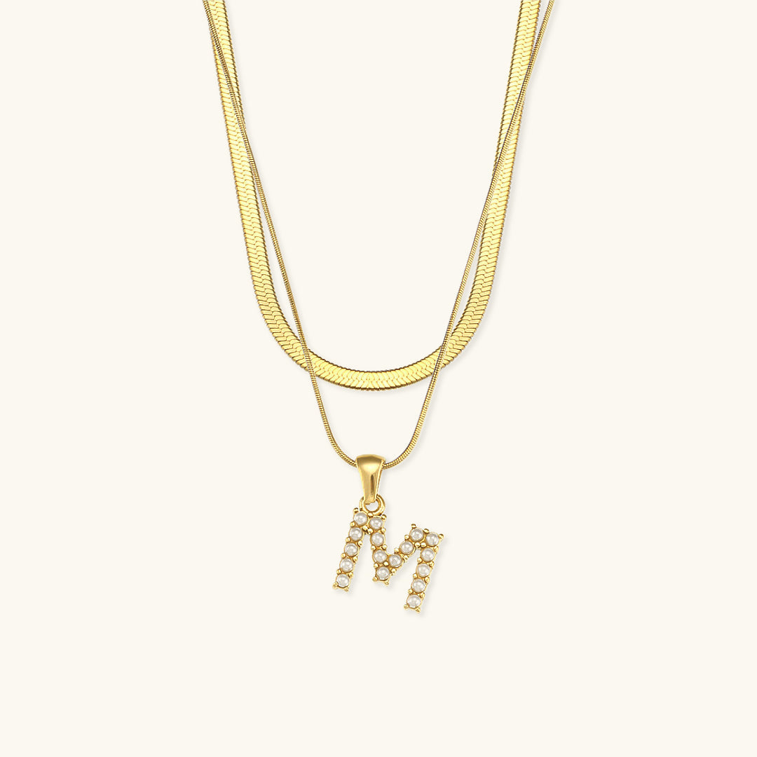 Fiona Lagd Gull Initialhalskjede" could be rewritten as "Fiona Gold Initial Necklace.