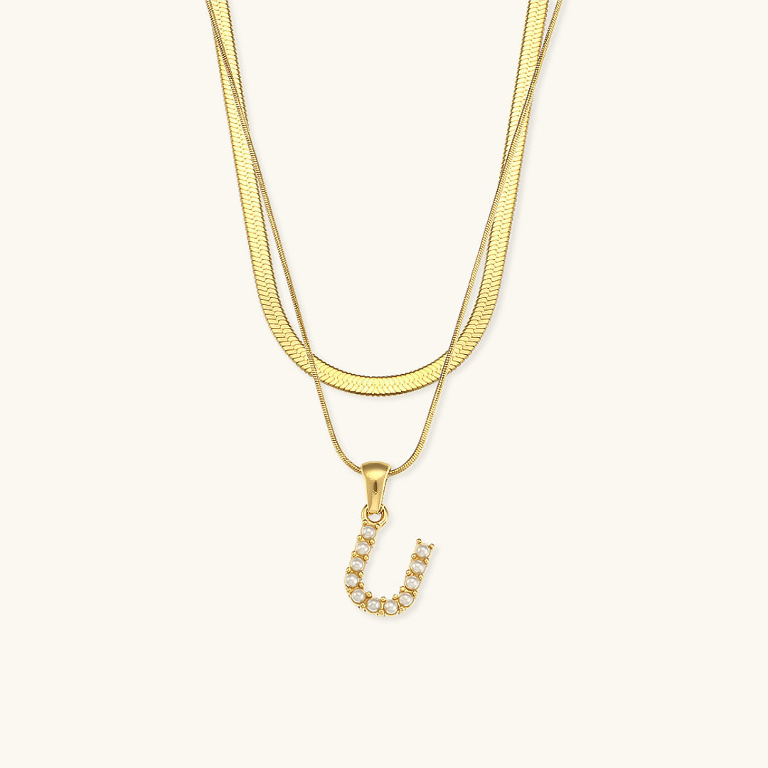 Fiona Lagd Gull Initialhalskjede" could be rewritten as "Fiona Gold Initial Necklace.