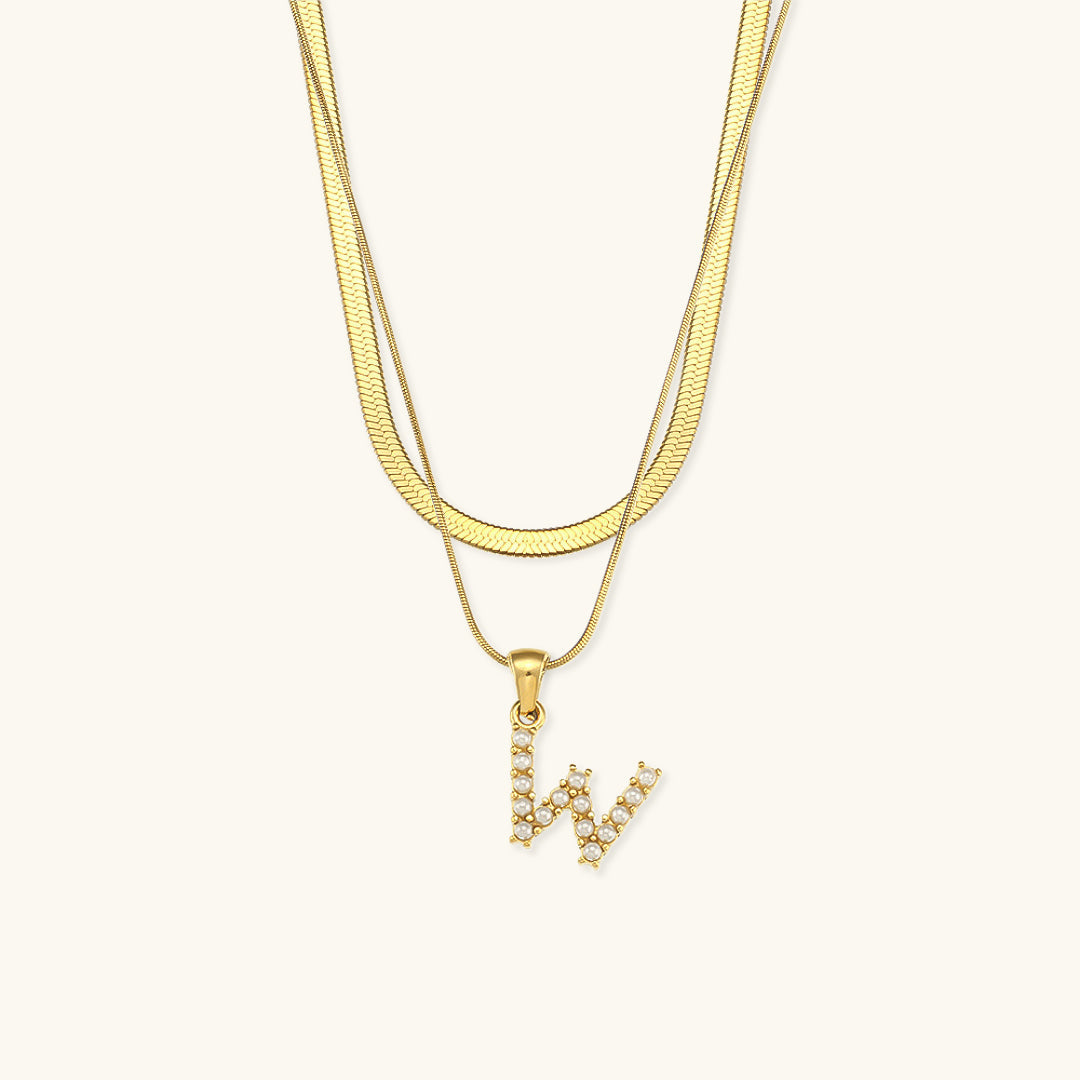 Fiona Lagd Gull Initialhalskjede" could be rewritten as "Fiona Gold Initial Necklace.