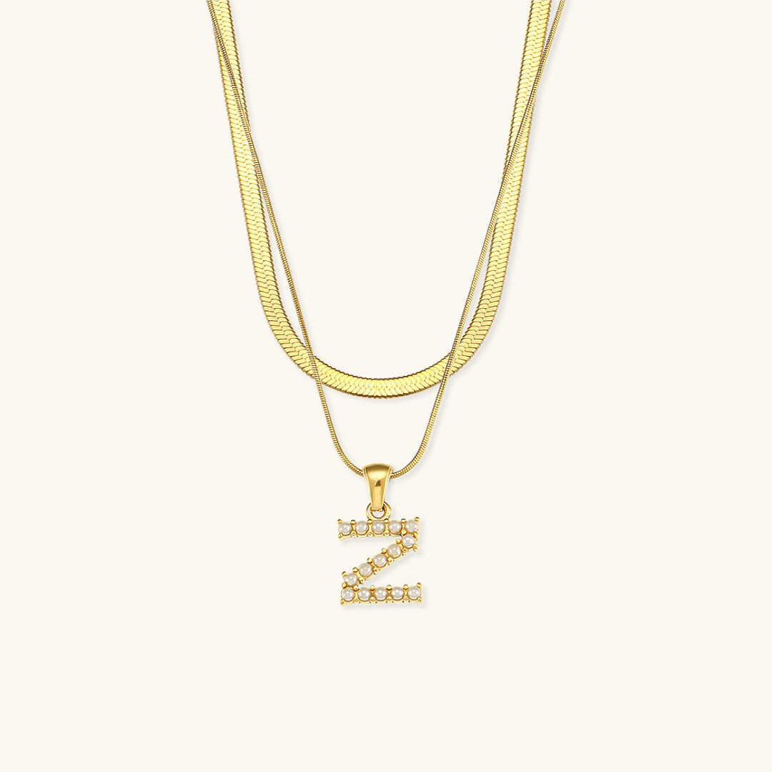 Fiona Lagd Gull Initialhalskjede" could be rewritten as "Fiona Gold Initial Necklace.